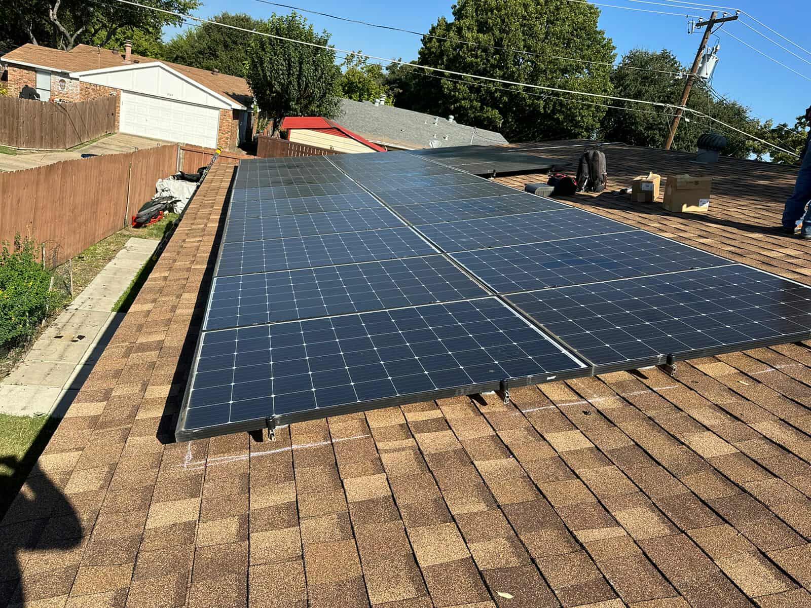 Array reinstalled on a finished shingle roof